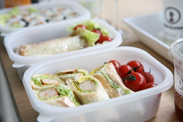 Sandwiches packed into plastic lunch boxes