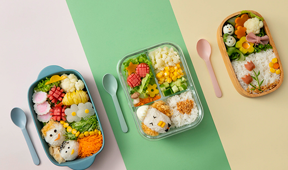 Flat lay nutritious cute childrens menu using bento box