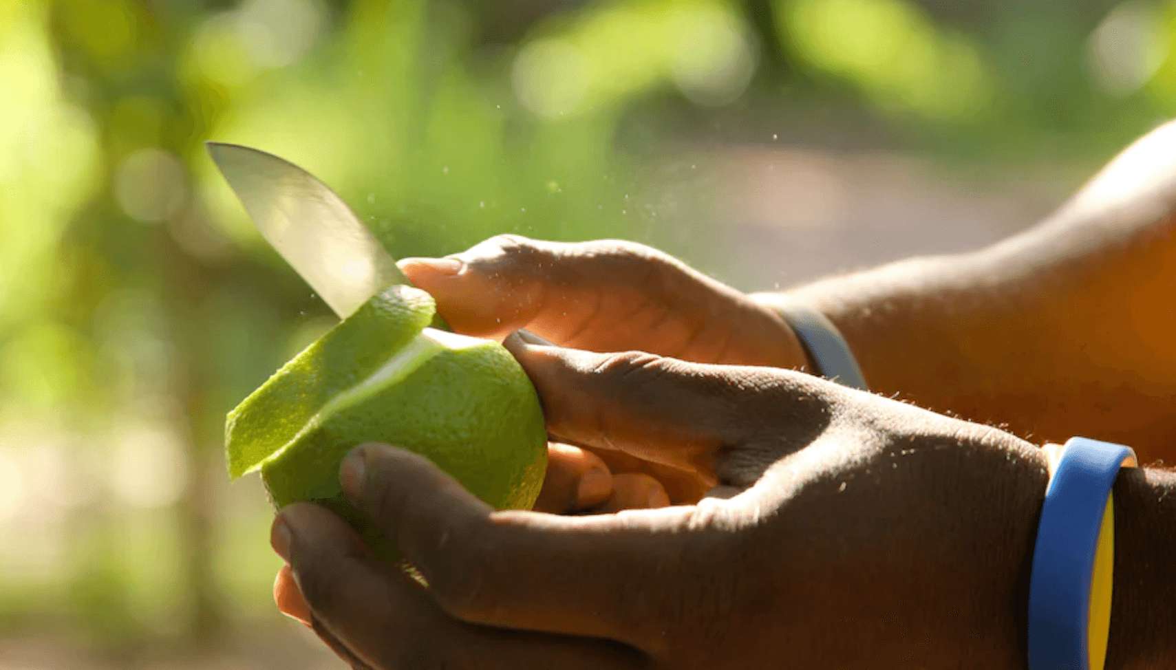 cutting fruit with a knife