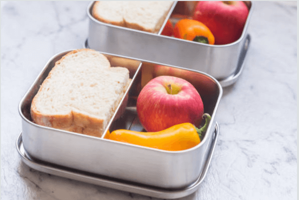 metal lunch box with healthy meals