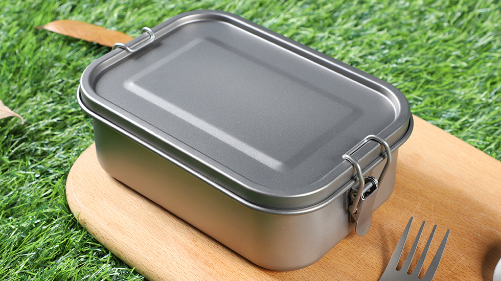 Lightweight portable sealed rectangular titanium lunch box with buckle