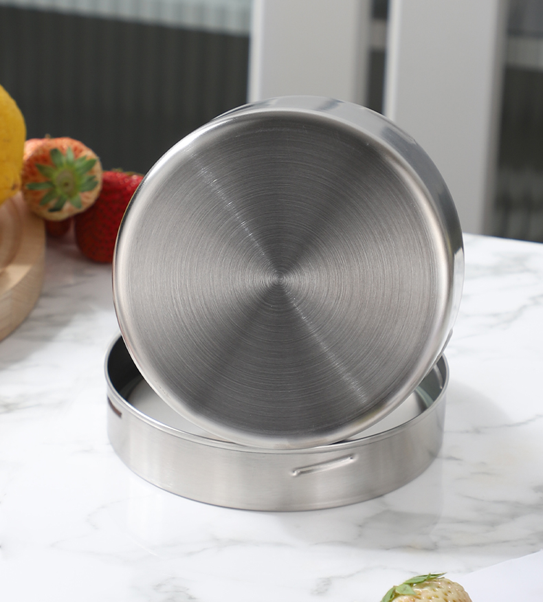 Brushed stainless steel texture close up — premium food grade finish